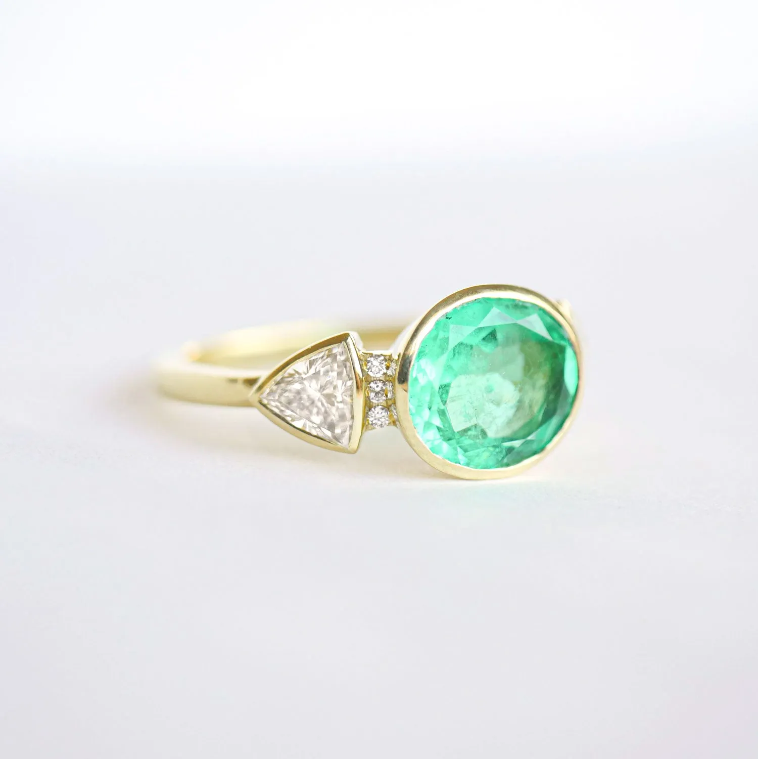 2.43 Carat Oval Colombian Emerald & Trillion Diamond Ring