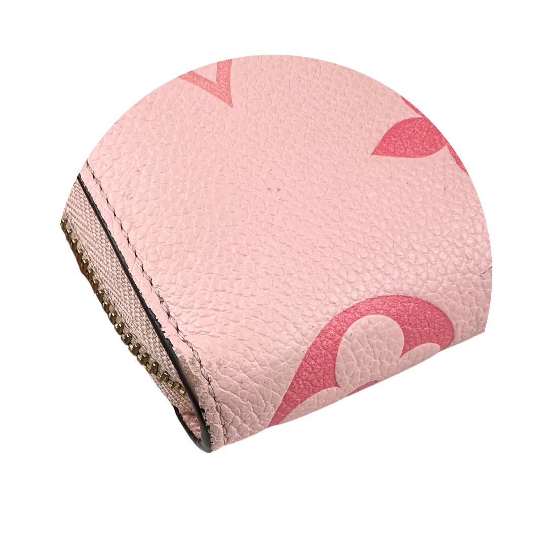 Louis Vuitton Pink By The Pool Empreinte Giant Monogram Zippy Wallet