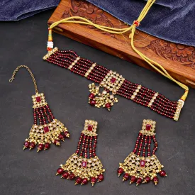 Sukkhi Astonish Reverse AD & Pearl Choker Gold Plated Maroon Necklace Set For Women