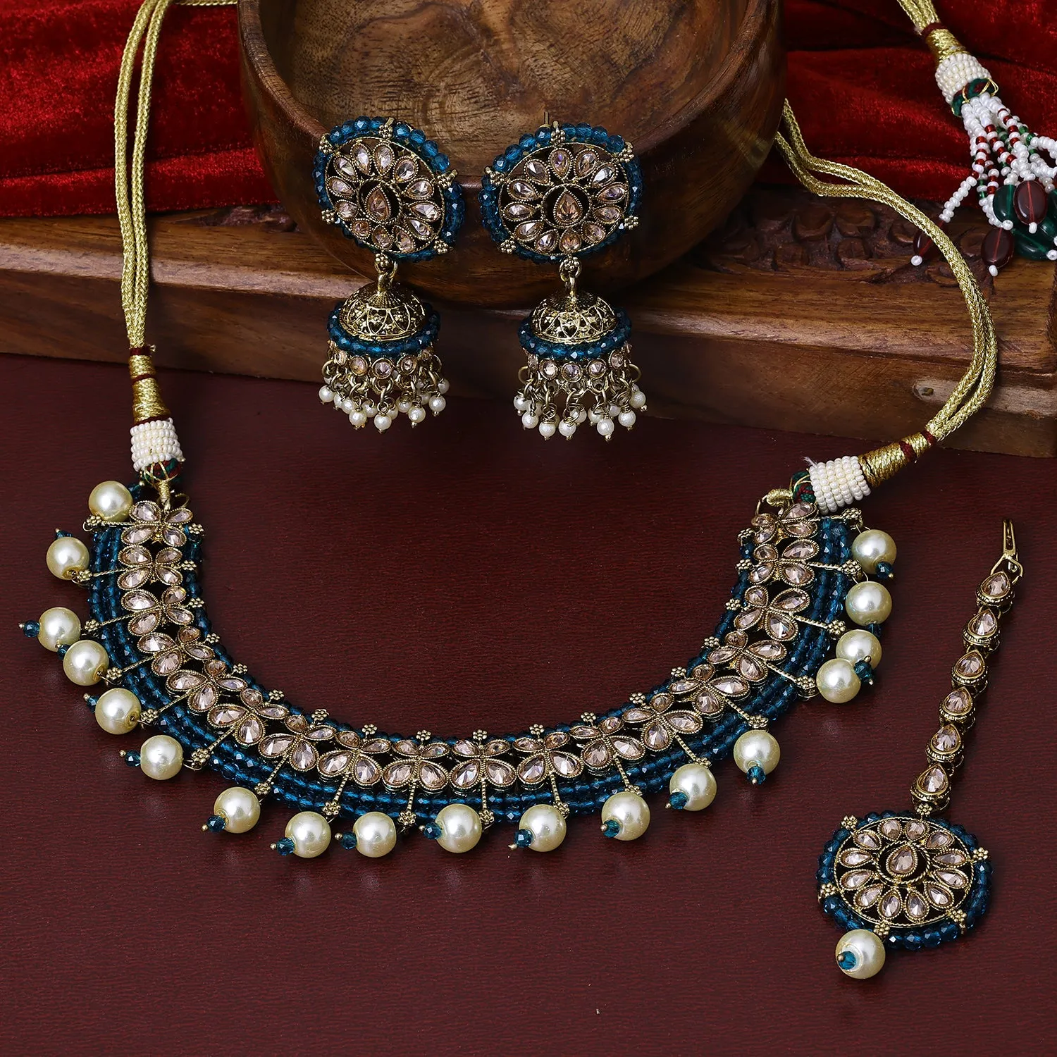 Sukkhi Bewitching Gold Plated Blue Pearl Choker Necklace Set With Maang Tikka for Women