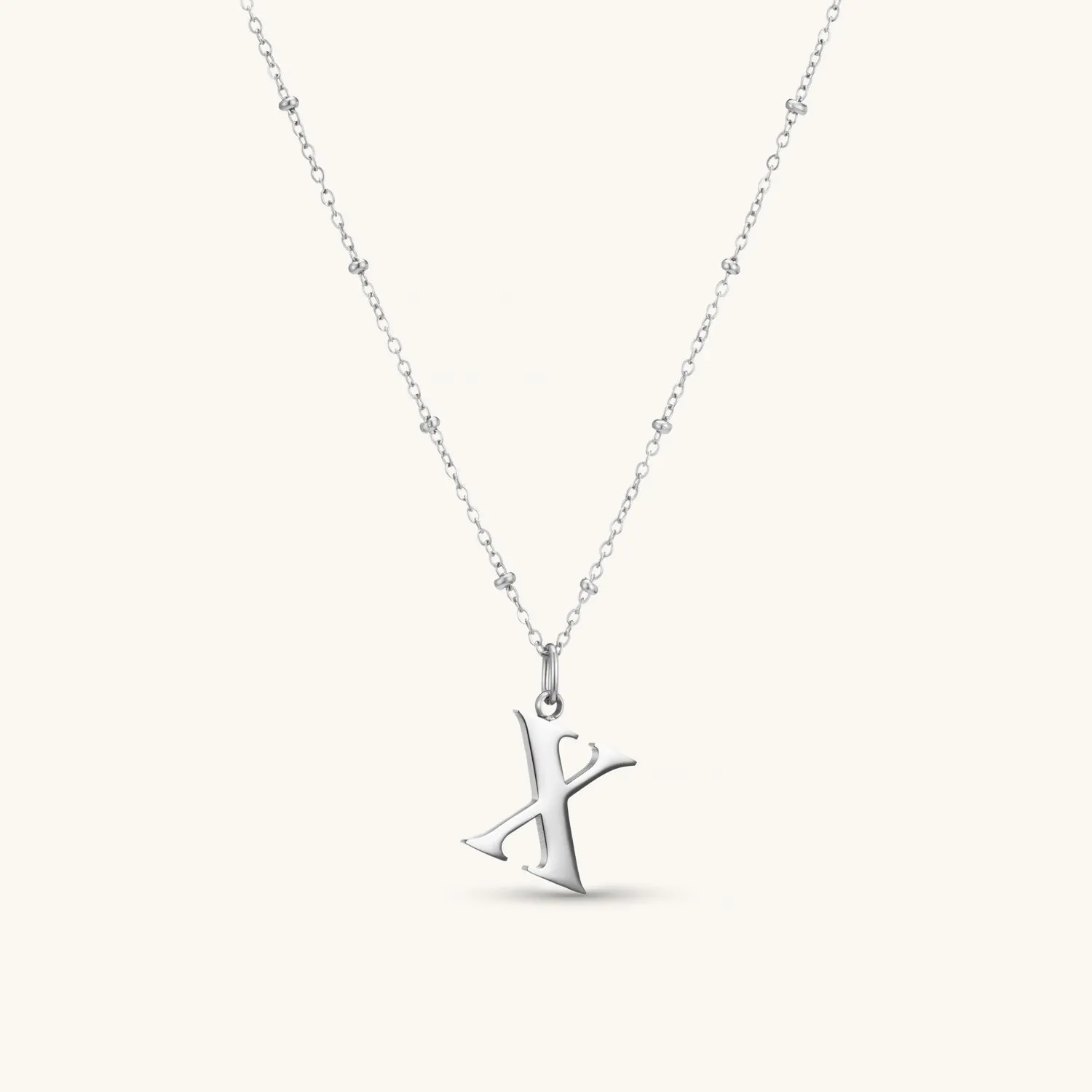 X Initial Pendant Necklace In Silver